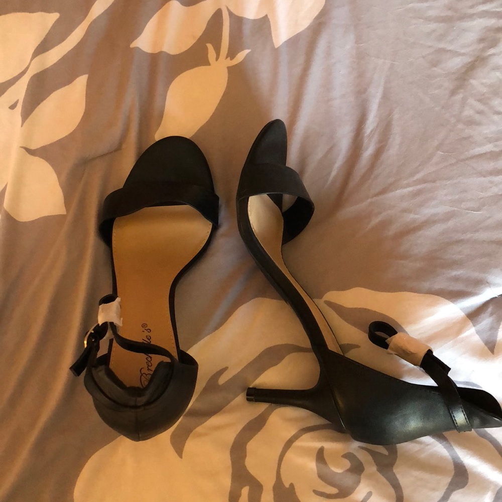 Black heels with small toe strap